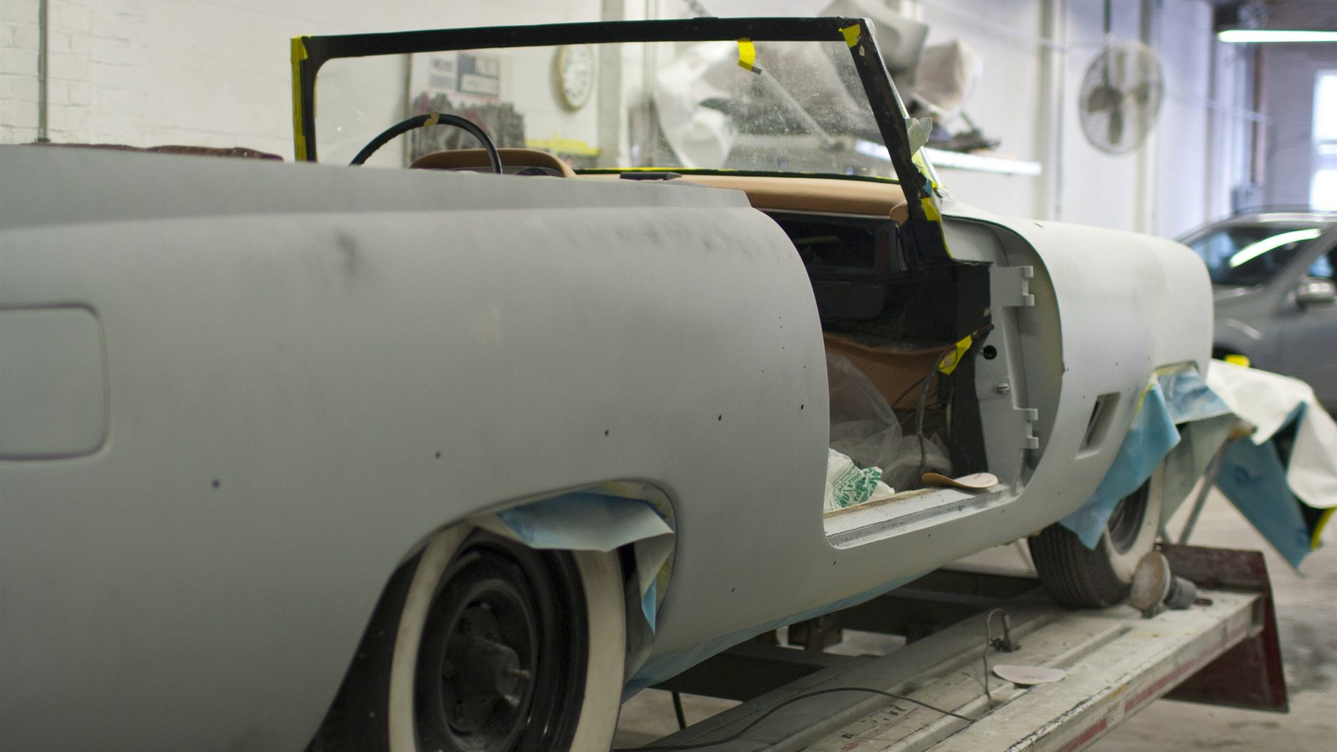 1950s Dual-Ghia D500 undergoing restoration, prepping for paint