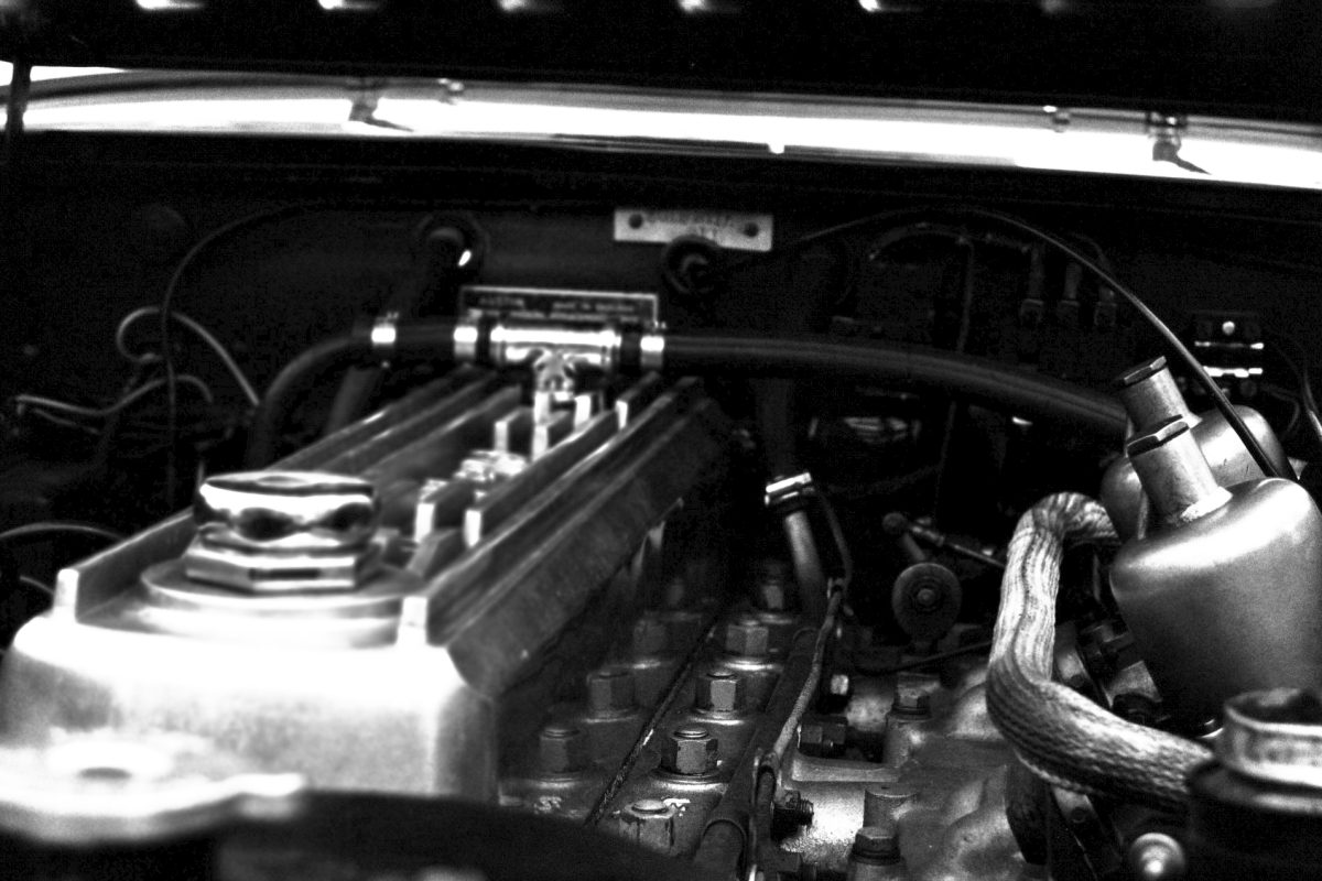 Austin-Healey 3000 engine bay, black and white film photograph
